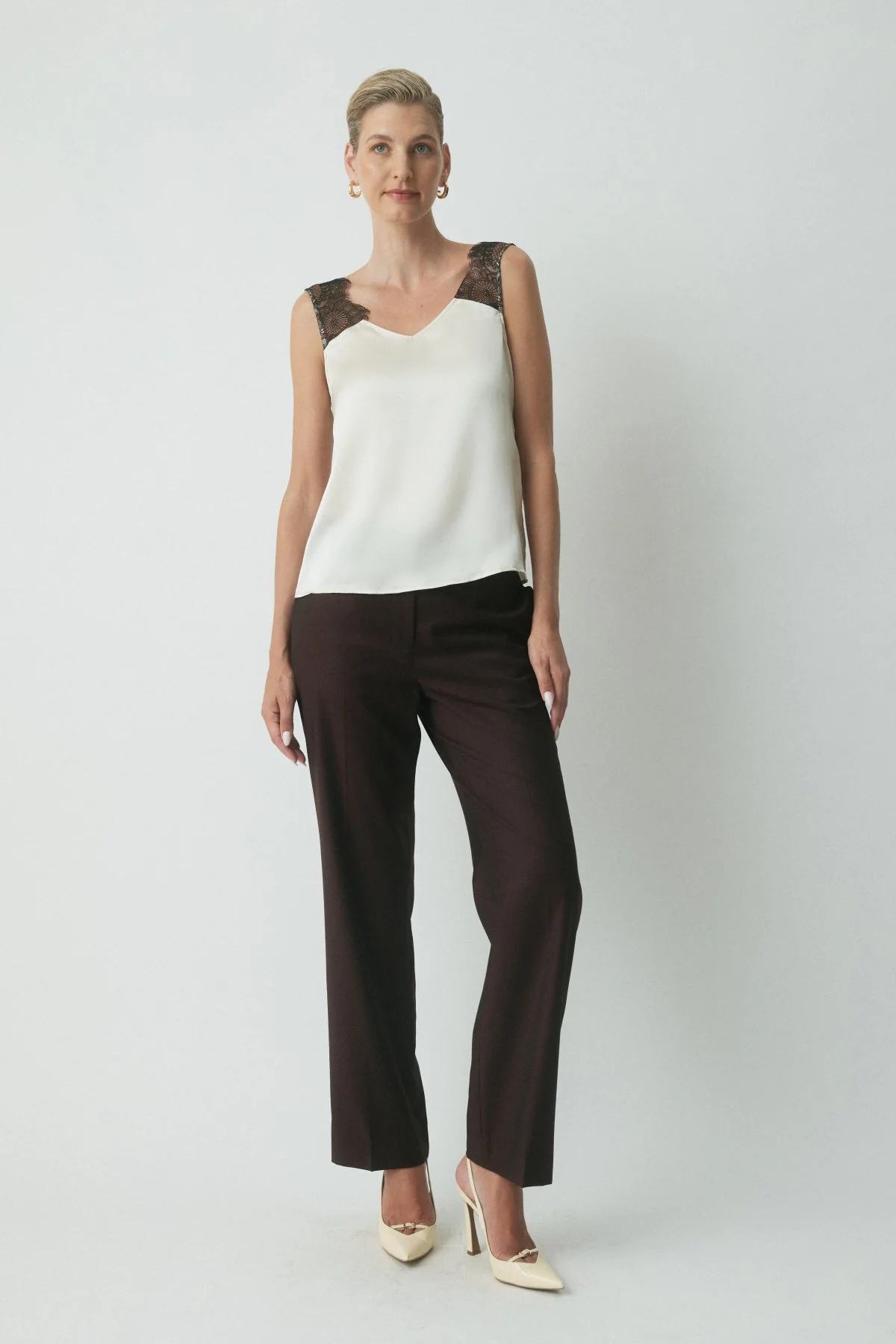 Women's Designer Sleeveless Tops & Blouses